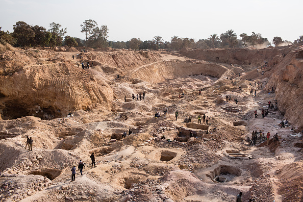 KOLWEZI, DRC: An open pit at the CDM (Congo DongFang Mining) Kasulo mine. Cobalt is a vital mineral needed for the production of rechargeable batteries. Two thirds of the world supply is located in southern Congo where men, women and children all work. Efforts are being made to stop child labor in the cobalt mines, but they have not been successful. Batteries needed for phones, computers and electric cars have pushed the global demand for Cobalt through the roof. Chinese companies and middlemen have the strongest hold on the market. Tech companies like Apple, Microsoft and Tesla are trying to find a way to access Congolese cobalt in a more humane way with proper accountability.